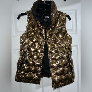 the North Face gold foil puffer vest